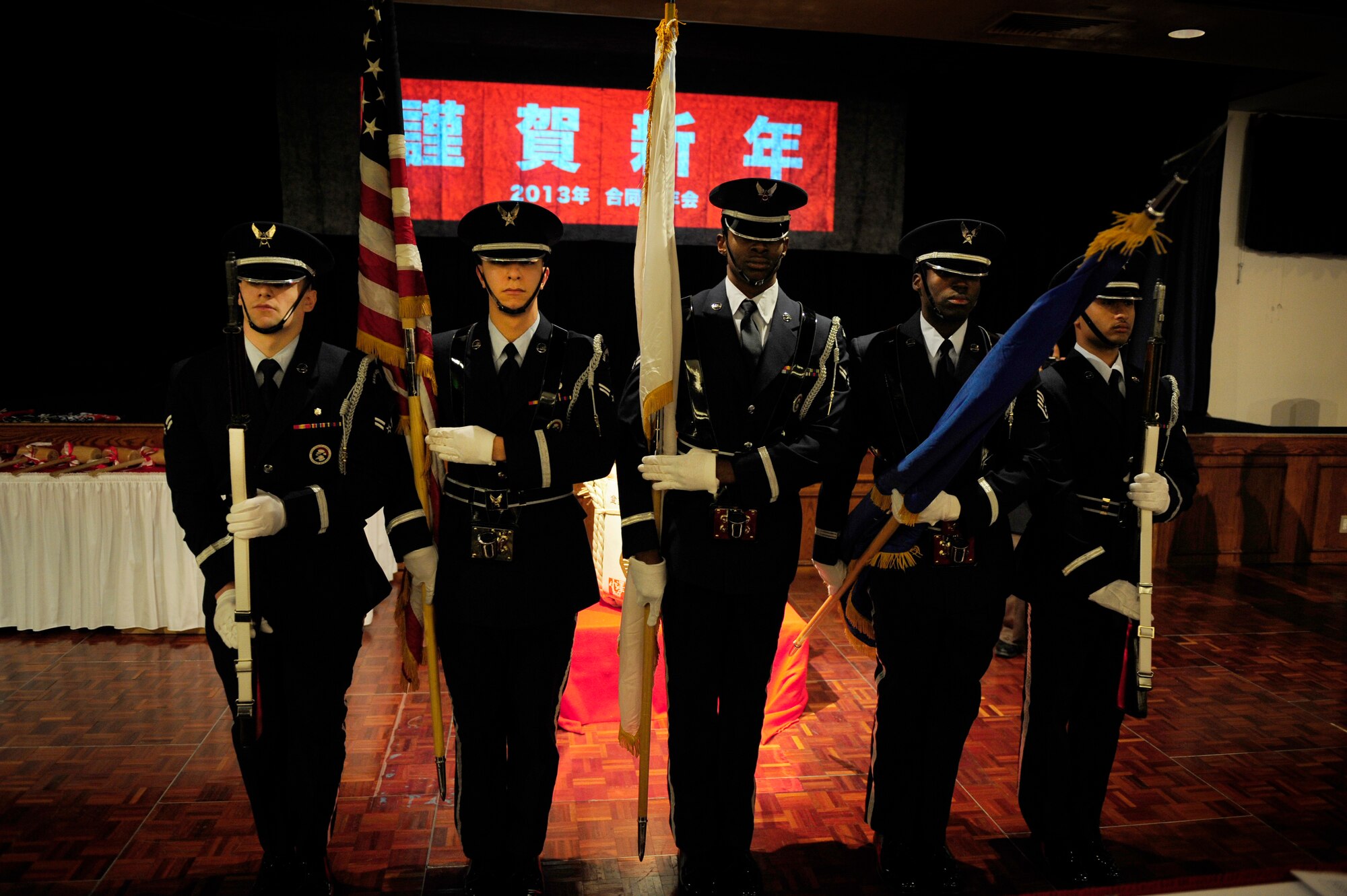 The Yokota Air Base Honor Guard posts the colors during a New Year's celebration hosted at Yokota Air Base, Japan, Jan. 26, 2013. The event reaffirmed U.S.-Japanese relations and was an opportunity to thank representatives from communities surrounding Yokota for their continued support and friendship. (U.S. Air Force photo by 2nd Lt. Jake Bailey)