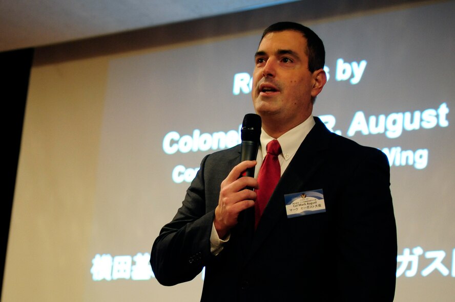 Col. Mark August, 374th Airlift Wing commander, addresses an audience of representatives from communities surrounding the base during a New Year's celebration hosted at Yokota Air Base, Japan, Jan. 26, 2013. Col. August reaffirmed the importance of U.S.-Japanese relations and thanked local organizations for their support and friendship over the years. (U.S. Air Force photo by 2nd Lt. Jake Bailey)
