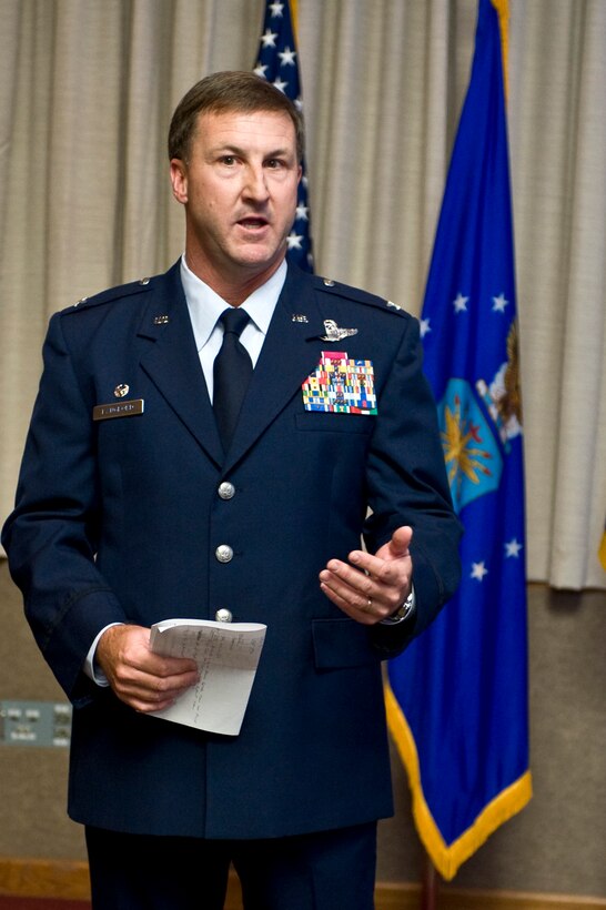 Col. Stephen Langford, Nevada Test and Training Range commander, speaks to members of his organization during the NTTR assumption of command ceremony, Jan. 28, 2013, at Nellis Air Force Base, Nev. The NTTR is the largest contiguous air and ground space available for peacetime military operations in the free world. The range occupies 2.9 million acres of land, 5,000 square miles of airspace, which is restricted from civilian air traffic over-flight, and another 7,000 square miles of military operating area, which is shared with civilian aircraft. (U.S. Air Force photo by Senior Airman Matthew Lancaster)