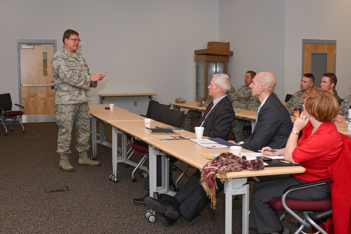 National Guard Col. Todd Freesemann, Savannah CRTC Commander, briefs military legislative assistants on economic impact of the Georgia Air National Guard to Savannah and force structure of the CRTC, January 25, 2013 at Savannah Air National Guard base in Garden City, Ga. (National Guard photo by Tech. Sgt. Charles Delano/released)