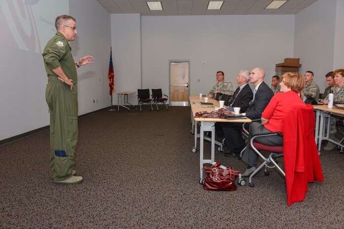 National Guard Col. Rainer Gomez, 165th Airlift Wing Air Commander, briefs military legislative assistants on economic impact of the Georgia Air National Guard to Savannah and force structure of the 165AW, January 25, 2013 at Savannah Air National Guard base in Garden City, Ga. (National Guard photo by Tech. Sgt. Charles Delano/released)