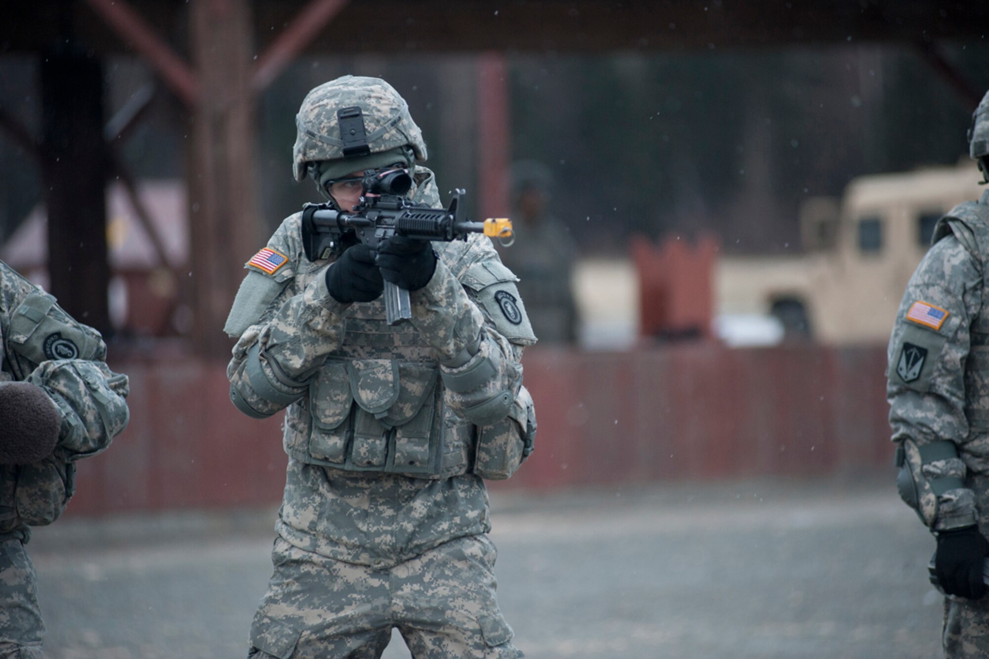Pvt. Sawyer Rowland trains in short-range marksmanship with an M-4 Carbine at the JBER Sports Fire Range Jan. 16. Rowland is a member of the 164th Military Police Company. His hometown is Brighton, Colo. Approximately 60 soldiers out of 80 in the company qualified on the M-4 carbine for the first time at this assignment during the monthly training. (U.S. Air Force photo/Staff Sgt. Robert Barnett)