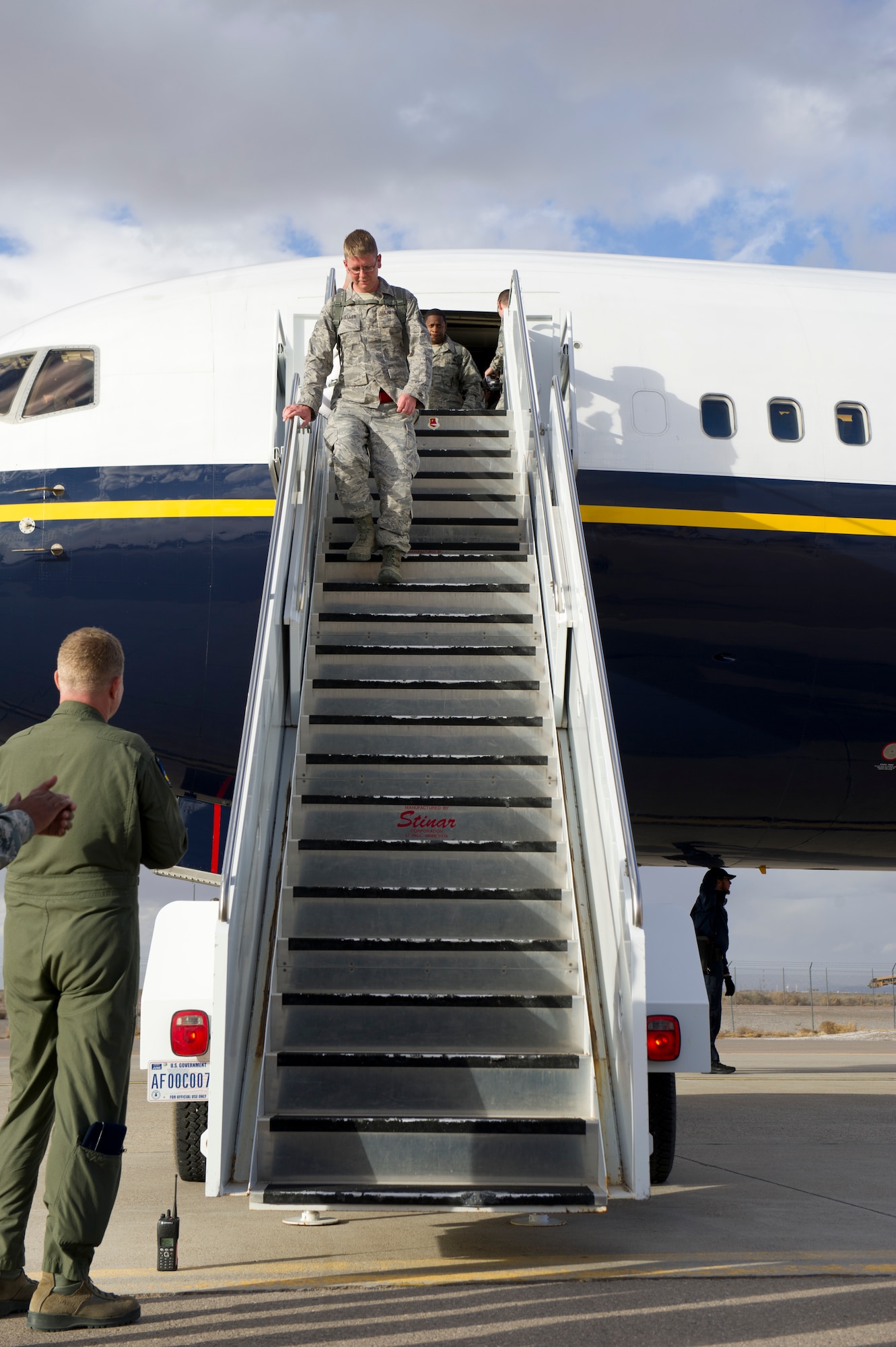 Colonel Andrew Croft, 49th Wing commander, welcomes back returning Airmen on the Holloman Air Force Base, N.M. flightline, Jan. 28. F-22 Raptors and around 200 personnel returned Monday from a 9-month deployment to Southwest Asia ensuring regional security and joint tactical air operations. (U.S. Air Force photo by Airman 1st Class Michael Shoemaker/Released)