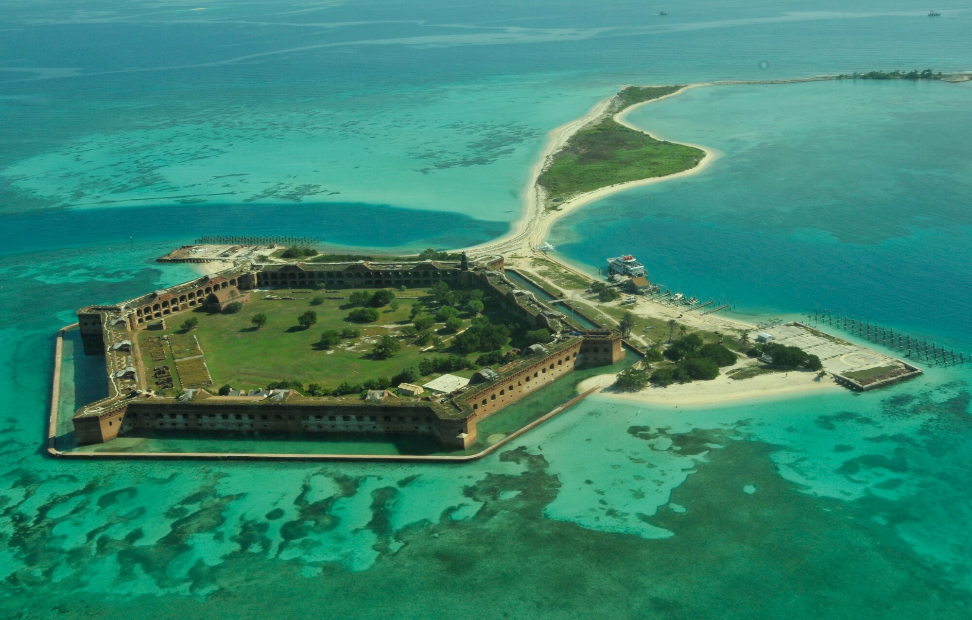 An aerial view of Fort Jefferson in the Dry Tortugas National Park Jan. 17. Air Force reservists both active and retired from Homestead Air Reserve Base’s 482nd Civil Engineer Squadron gathered at Fort Jefferson over several days in January to participate in a maintenance project for the National Park Service. 15 active reservists, six retired reservists, and one civilian contractor set up shop at Fort Jefferson as a training mission. The main project of the training was the construction of four reinforced concrete bases for large, 24-ton restored cannons to replicate the historical weapon's footprint. (U.S. Air Force photo/Ross Tweten)