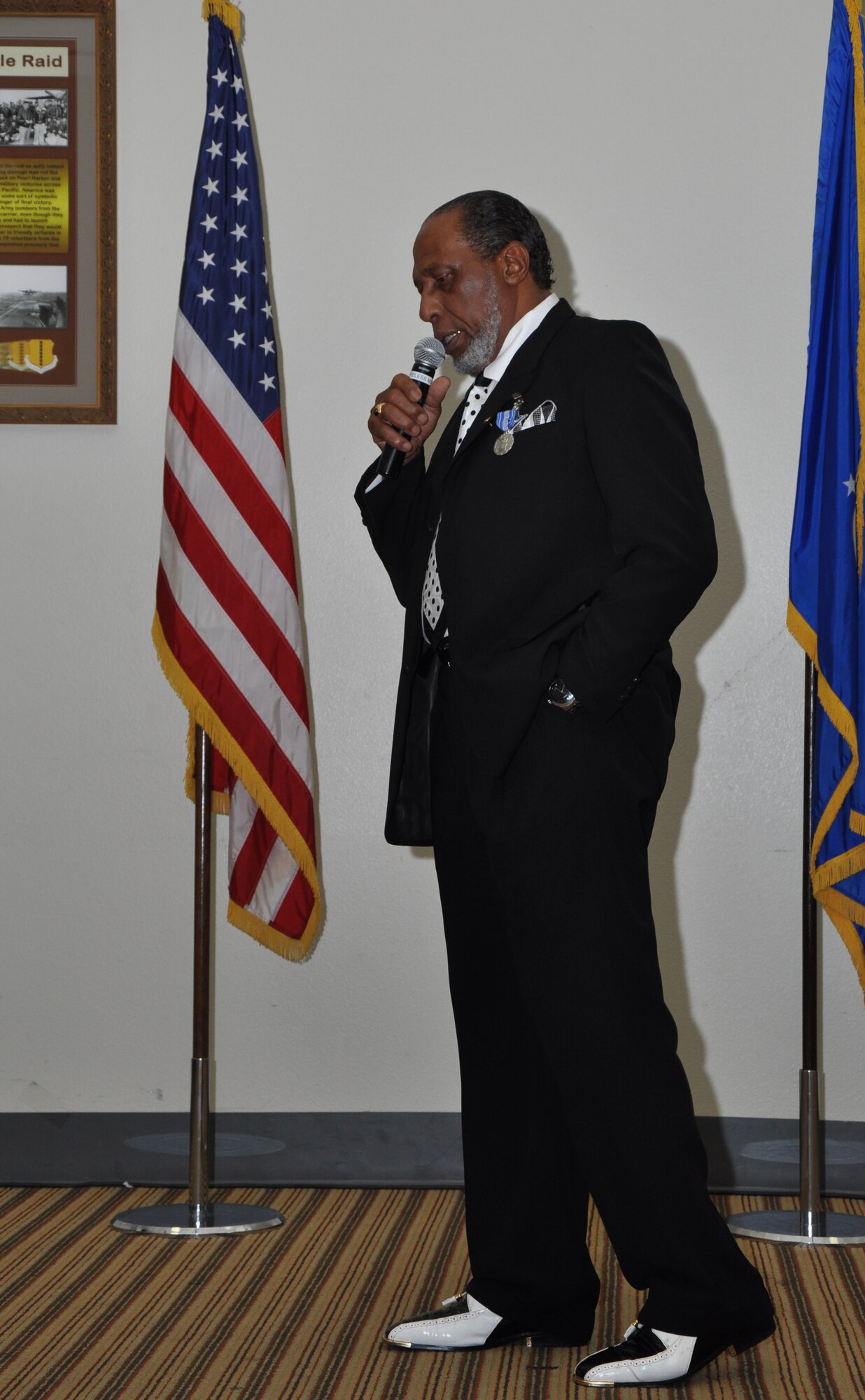 GOODFELLOW AIR FORCE BASE, Texas - Anthony Hooks Jr., former Airman and Family Readiness Center flight chief, gives a speech at the Event Center during his retirement ceremony, Jan. 25. Hook served in the Air Force for 28 years and as a civil servant since 1992. (U.S. Air Force photo/ Airman 1st Class Joshua Edwards)