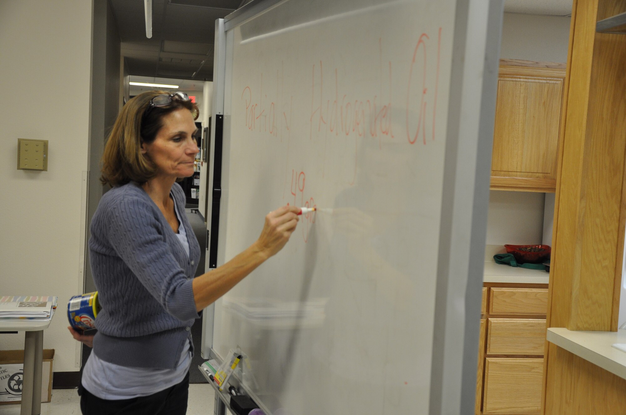 GOODFELLOW AIR FORCE BASE, Texas – Kathy Viau, 17th Medical Group health promotion dietitian, explains nutrition claims to the Better Body. Better Life. program participants at the Health and Wellness Center here, Jan. 17. She told the class that if a product has less than .49 grams of trans fats, the makers can claim they have zero trans fats. (U.S. Air Force photo/ Airman 1st Class Joshua Edwards)