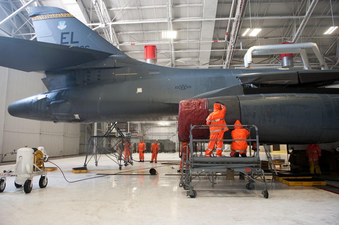 Ellsworth Airmen wash a B-1 bomber Jan. 16, 2013, at Ellsworth Air Force Base, S.D., to remove dirt and debris it collected while deployed.  The B-1 was being washed since its return from Southwest Asia and required a home station check before being reintegrated into Ellsworth’s fleet. (U.S. Air Force photo by Airman 1st Class Alystria Maurer/Released)
