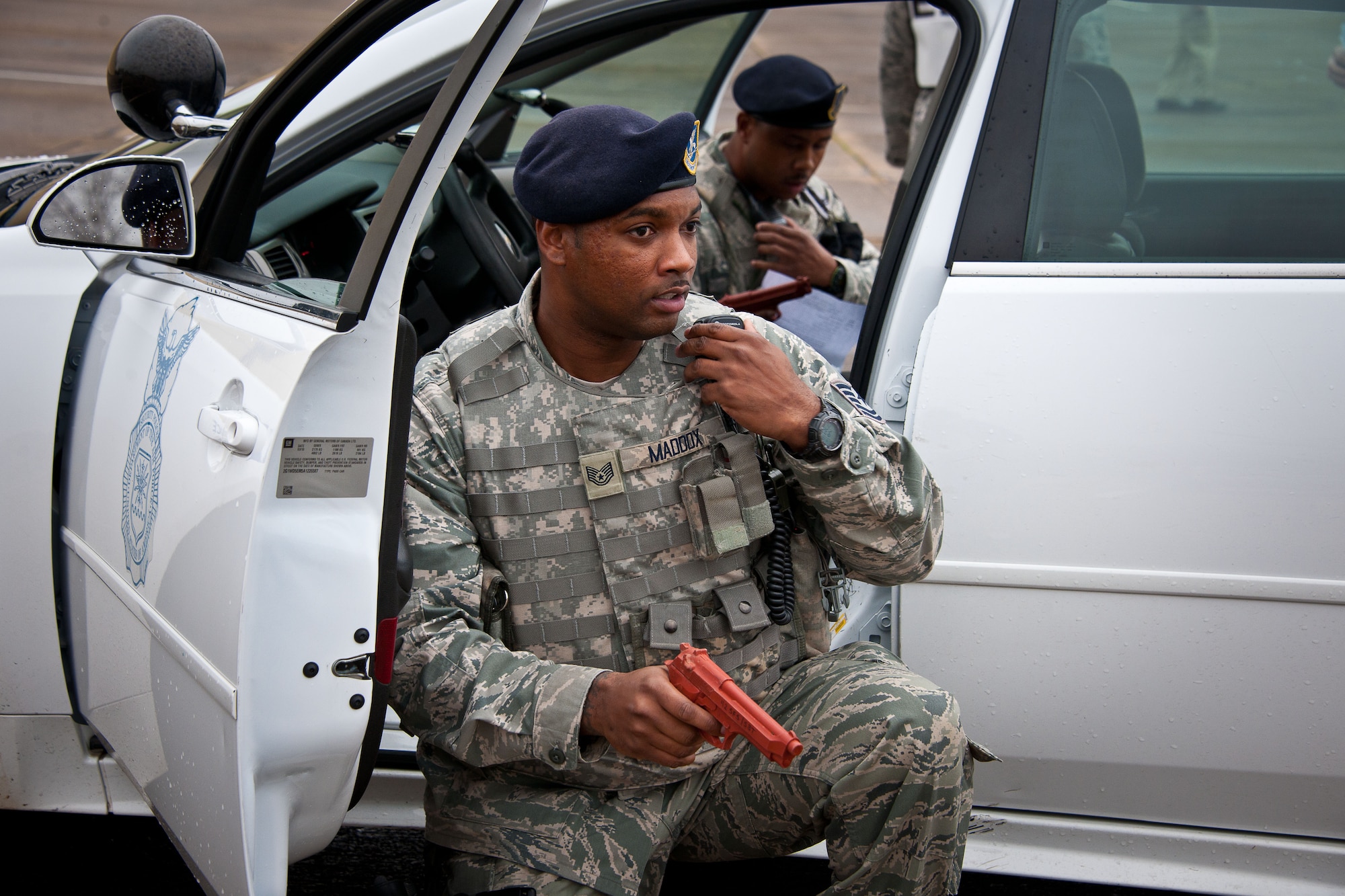 42nd Air Base Wing Security Forces Squadron Staff Sgt. Jerrell Maddox radios in for assistance during an active-shooter exercise Jan 16. (U.S. Air Force photograph by Donna L. Burnett)