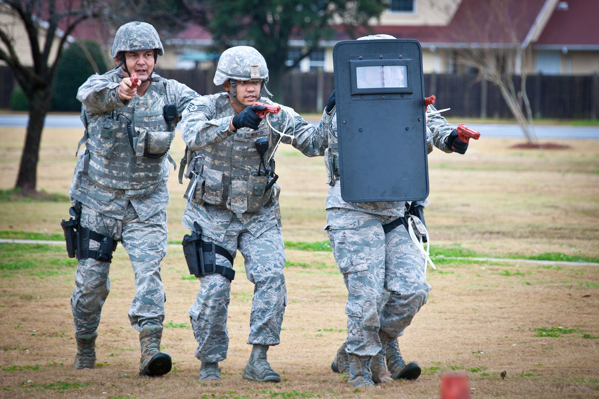 Members of the 42nd Security Forces Squadron conduct an active-shooter exercise Jan 16 in the parking lot by the Maxwell Air Force Base fitness center. (U.S. Air Force photograph by Donna L. Burnett)