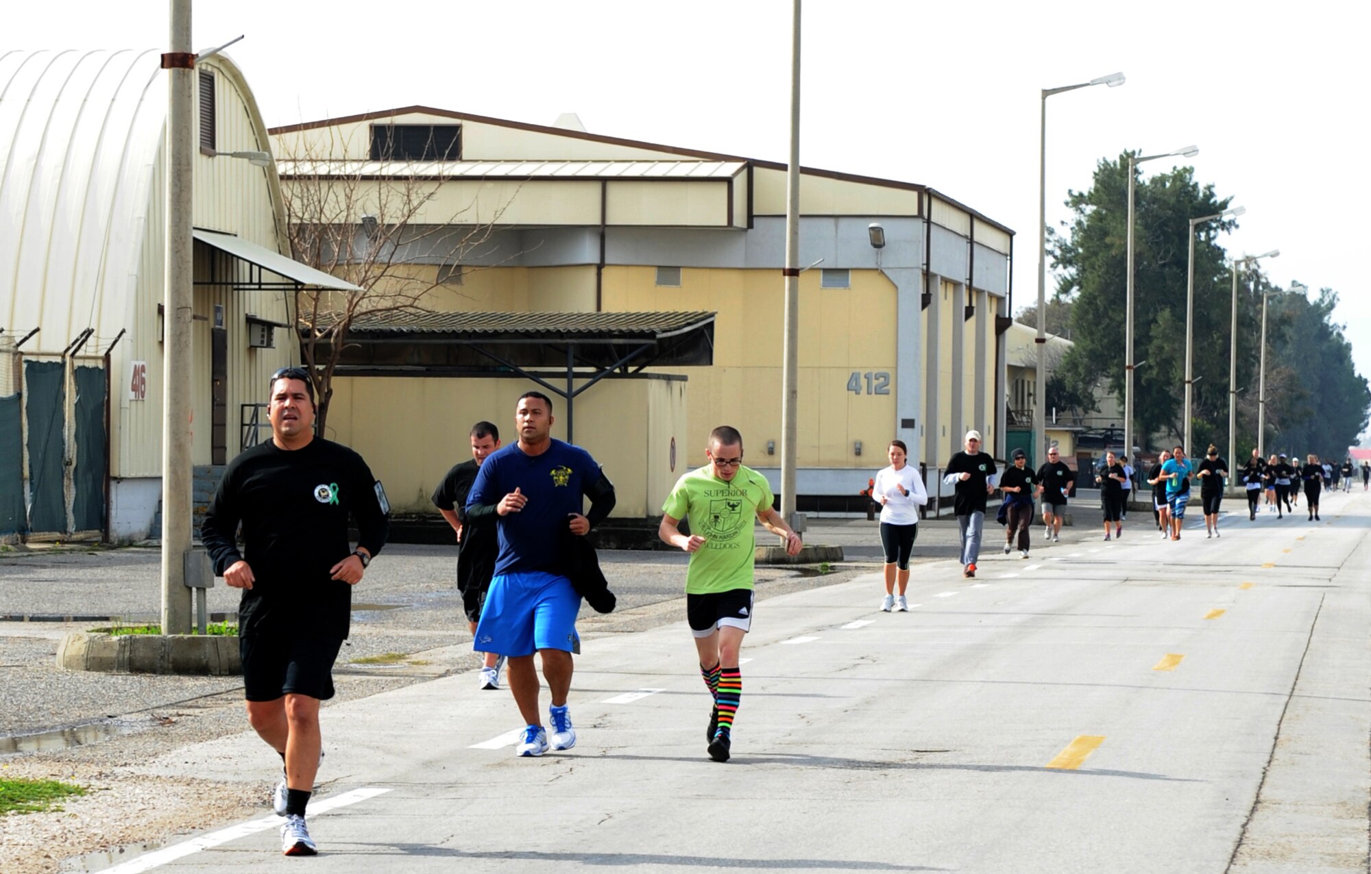 Runners jog toward the finish line during the Newtown, Conn., Memorial 5k Jan. 26, 2013, at Incirlik Air Base, Turkey. The Starlight Chapter of the Order of the Eastern Stars and the Masonic Lodge here coordinated the event to raise money for those affected by the Dec. 14 shooting at Sandy Hook Elementary School in Newtown. So far, the organizations have raised more than $1,000. (U.S. Air Force photo by Staff Sgt. Marissa Tucker/Released)