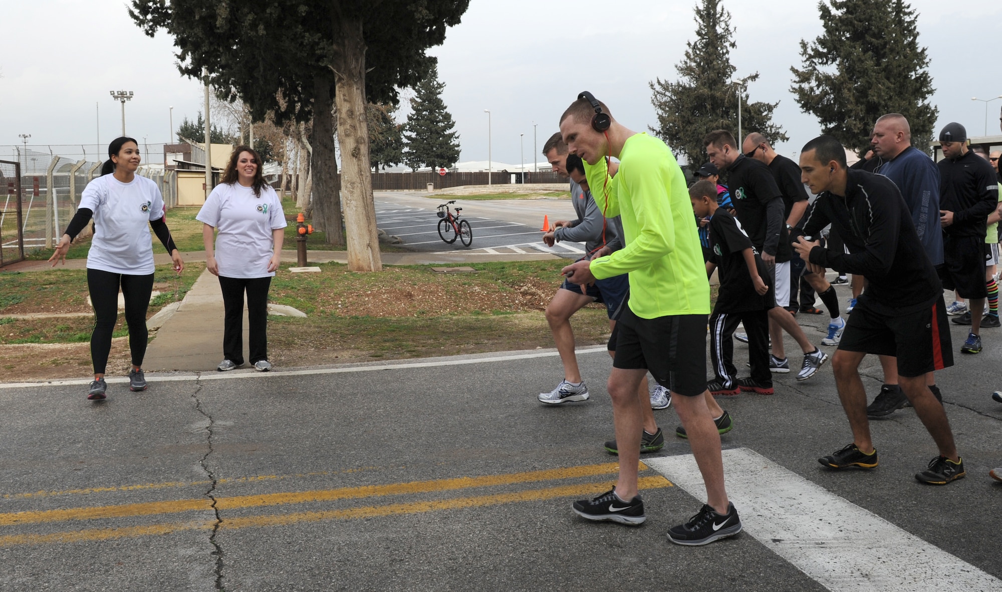 Runners take off at the start line of the Newtown, Conn., Memorial 5k Jan. 26, 2013, at Incirlik Air Base, Turkey. More than 100 people attend the event organized by The Starlight Chapter of the Order of the Eastern Stars and the Masonic Lodge here to raise money for those affected by the Dec. 14 shooting at Sandy Hook Elementary School in Newtown. (U.S. Air Force photo by Staff Sgt. Marissa Tucker/Released)

