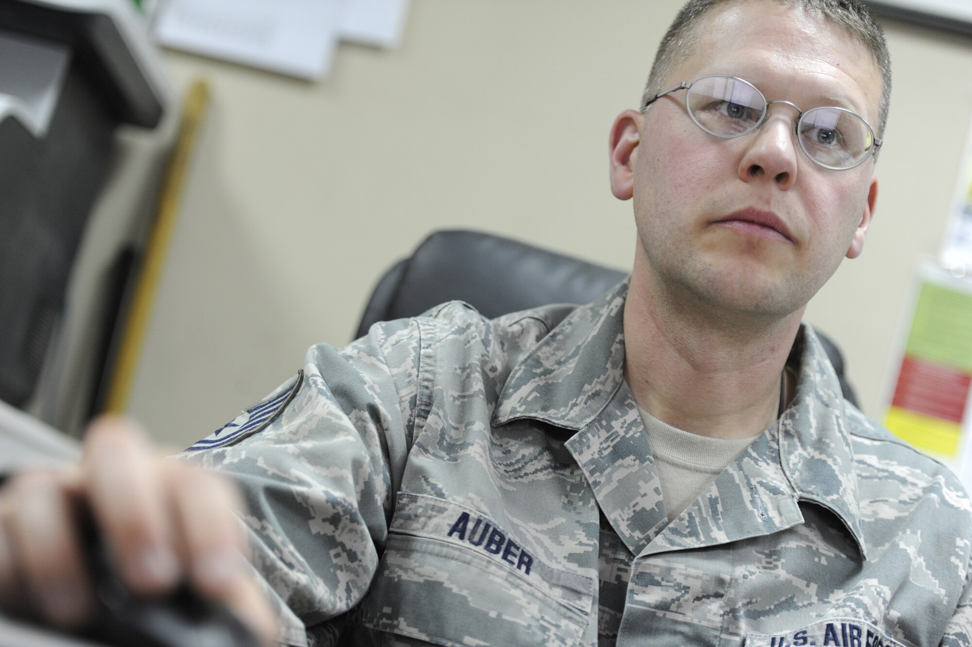 Technical Sgt. Aaron Auber, 386th Expeditionary Logistics Readiness Squadron, performs his duty as noncommissioned officer in charge of vehicle management and analysis at an undisclosed deployed location in Southwest Asia on Jan. 28, 2013.  Auber was awarded this weeks “Rock Solid Warrior” designation by the 386 Air Expeditionary Wing.  (U.S. Air Force photo by Staff Sgt. Austin Knox)