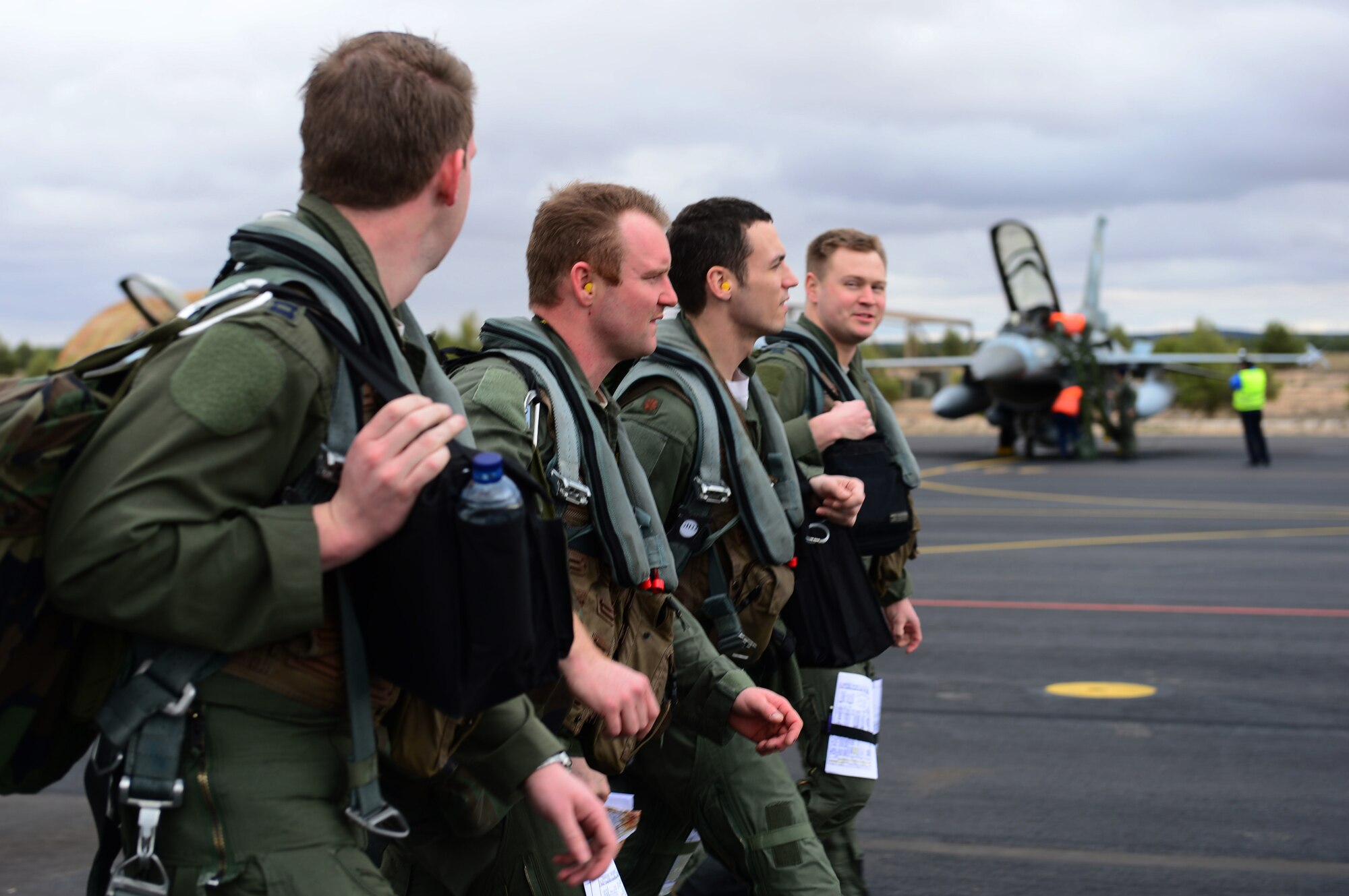 ALBACETE AIR BASE, Spain -- (from left) Capt. Aaron Schuett, Capt. Cody Clark, Maj. Jason Bianchi, Capt. Robert Hendrick, 493rd Fighter Squadron pilots, walk to their F-15C Eagles to prepare for a training mission during the Tactical Leadership Program Jan. 18, 2013. The 493rd FS is participating in the multi-national program, which develops key leadership and mission planning skills needed for NATO operations. (U.S. Air Force photo by Senior Airman Lausanne Morgan)