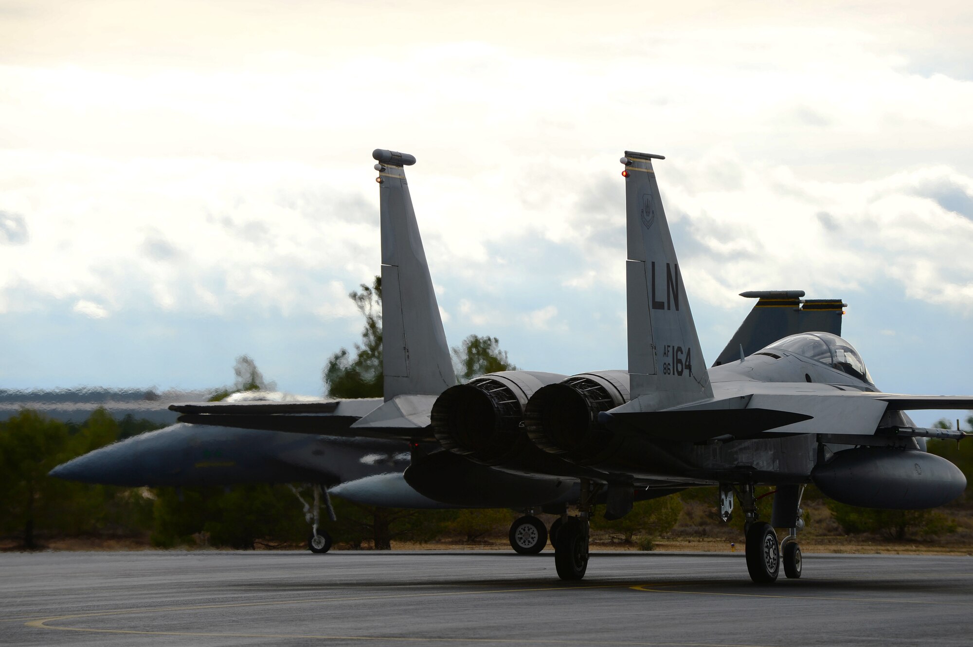 ALBACETE AIR BASE, Spain -- F-15C Eagles from the 493rd Fighter Squadron prepare to take-off during the Tactical Leadership Program Jan. 17, 2013. The 493rd FS is participating in the multi-national program, which develops key leadership and mission planning skills needed for NATO operations. (U.S. Air Force photo by Senior Airman Lausanne Morgan)