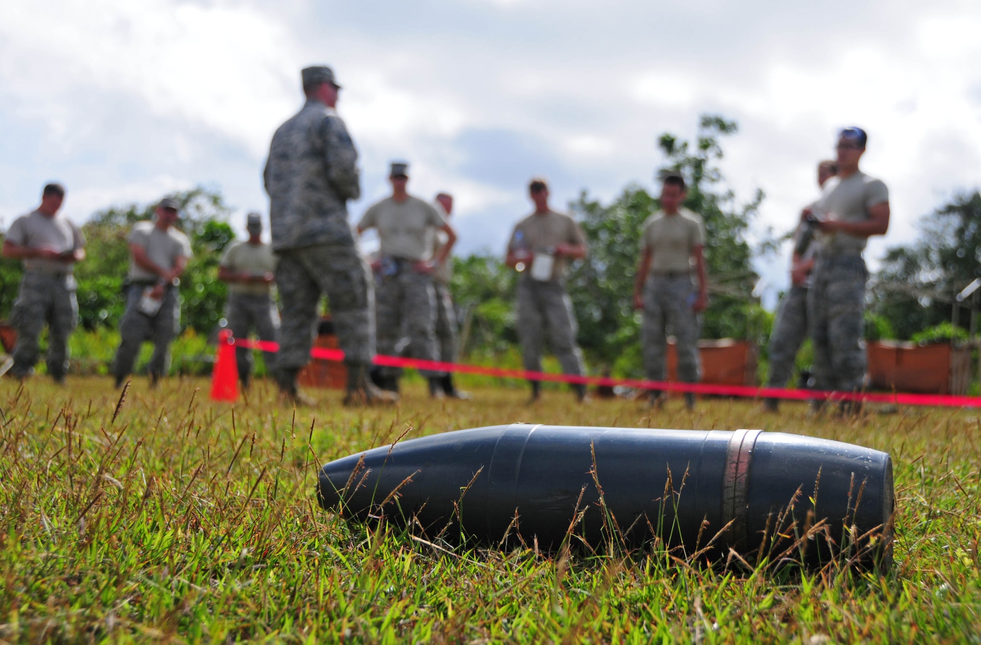 An unexploded ordnance is used to demonstrate proper procedures for conducting post-attack reconnaissance during chemical warfare PAR training at Andersen Air Force Base, Guam, Jan. 28, 2013. The 36th Civil Engineer Squadron readiness and emergency management flight conducts chemical, biological, radiological, nuclear and high-yield explosives training in order to ensure that Airmen are ready to respond and continue operations in hazardous environments. (U.S. Air Force photo/Airman 1st Class Marianique Santos/Released)
