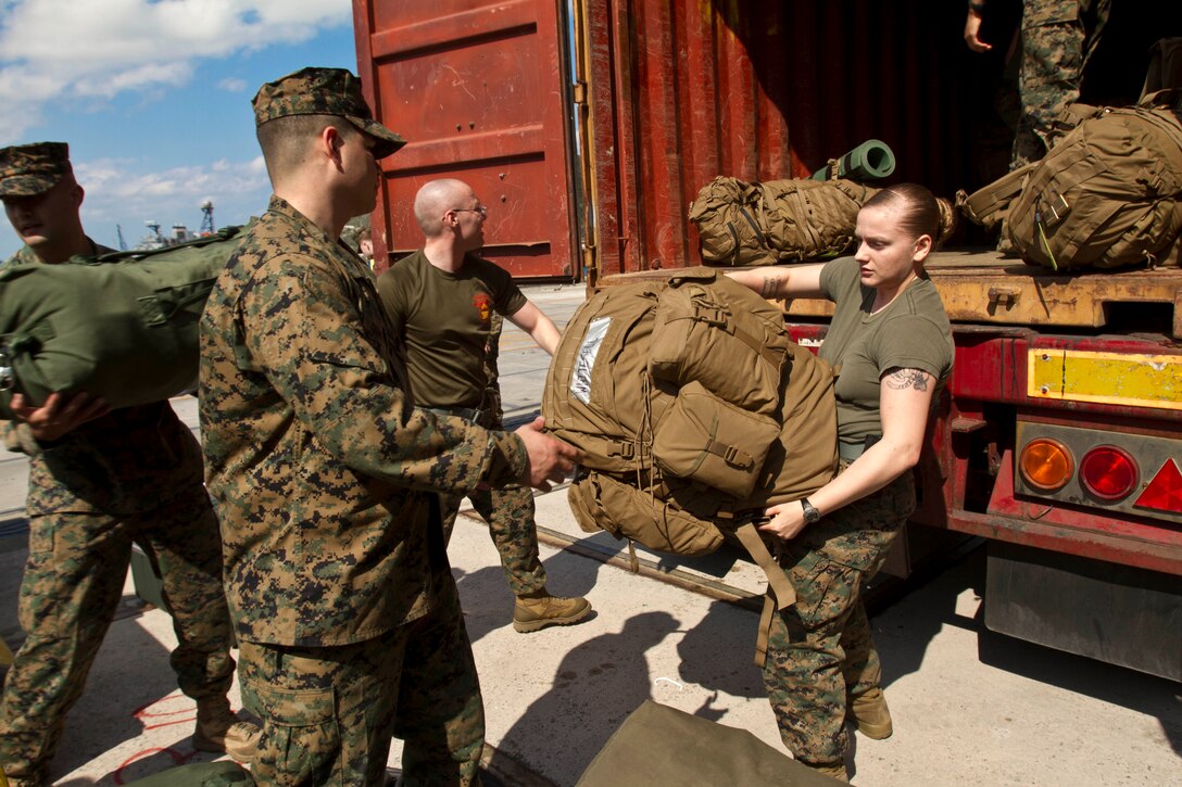 Marines with the command element, 31st Marine Expeditionary Unit, unload gear for embarkation with Amphibious Squadron 11 here, Jan 29. The unit is deploying for the regularly scheduled Spring Patrol and  to participate in exercise Cobra Gold 2013 in the Kingdom of Thailand. Cobra Gold is a multilateral training exercise that the United States has participated in for more than three decades. The 31st MEU is the only continuously forward-deployed MEU and is the Marine Corps’ force in readiness in the Asia-Pacific region.