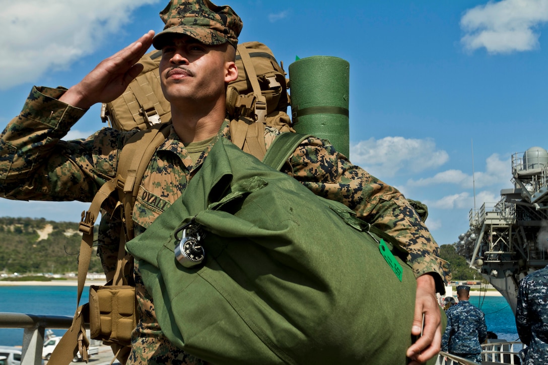 Lance Cpl. Pablo A. Ovalle, an ammunition technician with Combat Logistics Battalion-31, 31st Marine Expeditionary Unit, and a native of Bronx, N.Y., salutes the American flag before boarding the USS Bonhomme Richard during embarkation with Amphibious Squadron 11 here, Jan 29. The unit is deploying for the regularly scheduled Spring Patrol and to participate in exercise Cobra Gold 2013 in the Kingdom of Thailand. Cobra Gold is a multilateral training exercise that the United States has participated in for more than three decades. The 31st MEU is the only continuously forward-deployed MEU and is the Marine Corps’ force in readiness in the Asia-Pacific region.