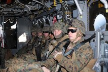 Marines with 8th Communications Battalion, II Marine Expeditionary Force, load into an MV-22B Osprey piloted by Marines with Marine Medium Tiltrotor Squadron 263 to a training center near Atlantic Beach, N.C., Jan. 23. VMM-263 Marines transported more than 30 Marines during this field training exercise.