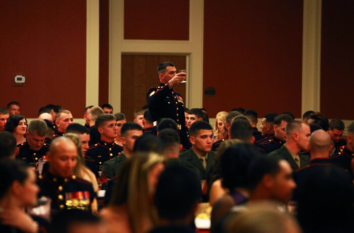 A Marine with Combat Logistics Battalion 24, 2nd Marine Logistics Group proposes a toast to the Marines of the past during the unit’s mess night aboard Camp Lejeune, N.C., Jan. 25, 2013. The mess night served as a chance for the Marines and sailors to bond and celebrate their heritage after the battalion’s nine-month deployment with the 24th Marine Expeditionary Unit, which returned to Camp Lejeune December 2012. 