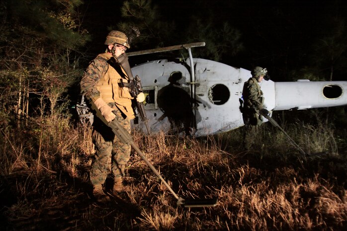 Marines with Marine Wing Support Squadron 272 simulated a UH-1Y Huey being shot down in enemy territory and having to tactically, safely and quickly recover the aircraft and secure the area in a training landing zone aboard Marine Corps Base Camp Lejeune, Jan. 24.  The Marines were giving only 24-hour notice beforehand to plan, execute and complete the mission.