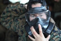 Marines with Combat Logistics Regiment 27, 2nd Marine Logistics Group underwent their annual gas-chamber training aboard Camp Lejeune, N.C., Nov. 29, 2012. The servicemembers practiced donning and clearing their gas masks in a contaminated environment, and received classroom instruction on how to react after a chemical, biological, radiological or nuclear attack in the field. 