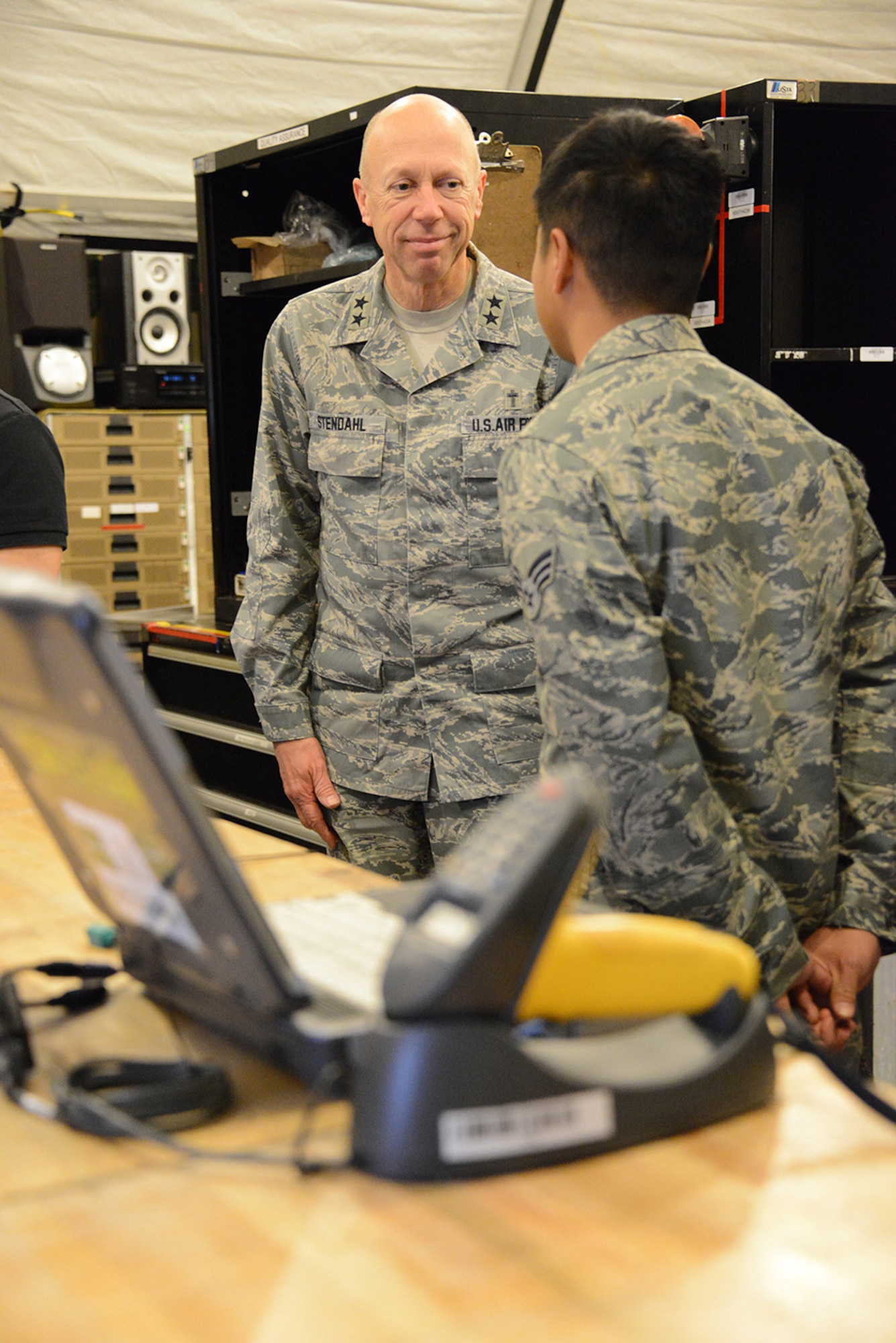 U.S. Air Force Chaplain (Maj. Gen.) Howard Stendahl, Air
Force Chief of Chaplains talks with Senior Airman Chad Vanrachack, 353rd
Special Operations Maintenance Squadron, during his tour of 353rd SOMXS
facilities Jan. 24, 2013.   Stendahl visited the 353rd Special Operations
Group and met with leadership along with the Airmen to learn more about the
group's mission during his visit to Kadena Air Base. (U.S. Air Force
photo/Tech. Sgt. Kristine Dreyer)

