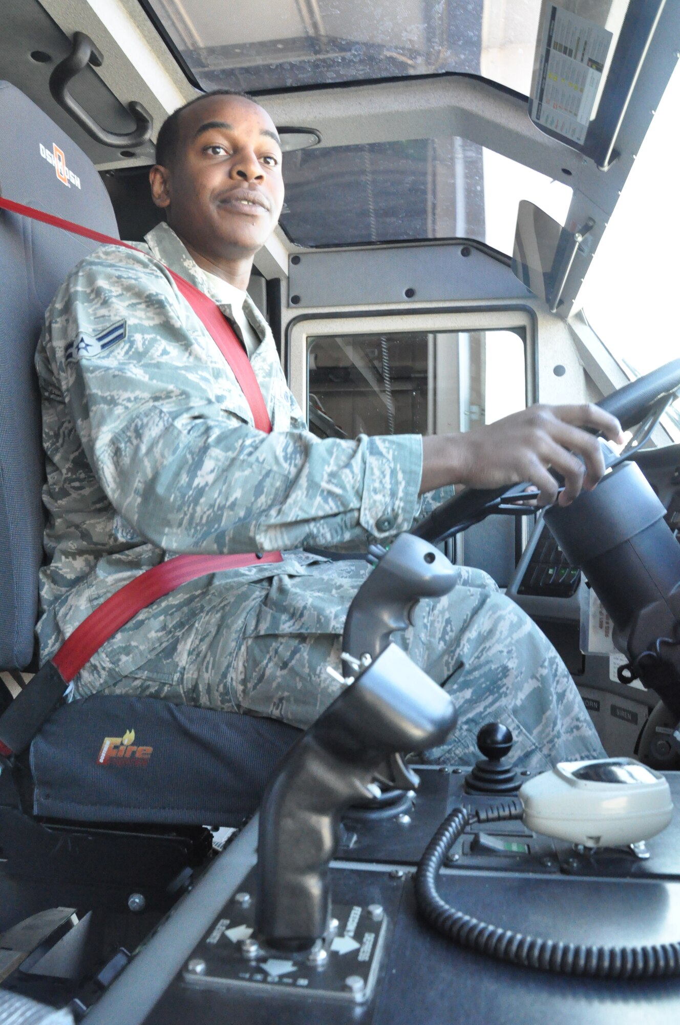 Airman 1st Class Kendall Fair, 375th Civil Engineer Squadron firefighter rescued an unconscious maintainer inside the belly of the aircraft during his deployment to Al-Dhafra Air Base. After the victim was rescued, he was sent to the hospital and made a full recovery by the next day. (U.S. Air Force photo/Airman 1st Class Jake Eckhardt)