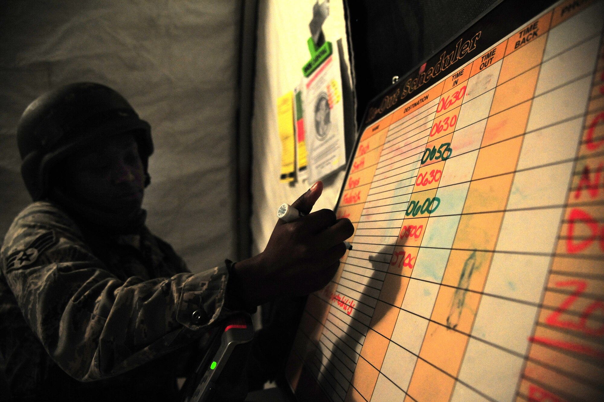 U.S. Air Force Senior Airman Tantania Brown, 4th Medical Support Squadron administrative technician, updates an accountability board during Operational Readiness Exercise Coronet Warrior 13-01B, at a simulated deployed location on Seymour Johnson Air Force Base, N.C., Jan. 30, 2013. Unit control cells must be aware of their personnel’s whereabouts at all times during the ORE to ensure safety. (U.S. Air Force photo/Airman 1st Class Aubrey White/Released)