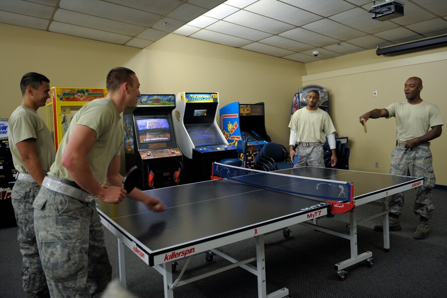 Airmen participate in a game of pingpong during the Martin Luther King Jr. Birthday celebration at Moody Air Force Base, Ga., Jan. 24, 2013. This federal holiday is celebrated the third Monday in January to honor the civil rights leader. (U.S. Air Force photo by Senior Airman Eileen Meier/Released)