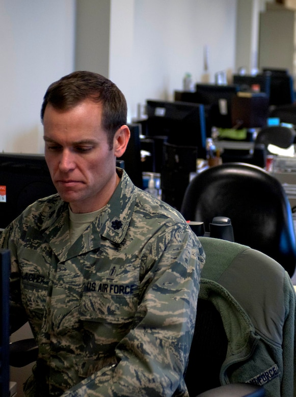 Dr. [Lt. Col.] Joseph Gallagher, 633rd Medical Operations Squadron gastroenterologist, transcribes notes from previous appointments in the new multiservice clinic Jan. 23, 2013, in U.S. Air Force Hospital Langley, Langley Air Force Base, Va. According to the U.S. Department of Health and Human Resources, 60 to 70 million people are affected by digestive diseases, and account for 13.5 million hospitalizations yearly. (U.S. Air Force photo by Airman 1st Class R. Alex Durbin/Released)