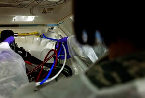 U.S. Air Force Senior Airman Samantha Sickler, 633rd Medical Operations Squadron gastroenterology technician, removes a laparoscopic camera from the high-pressure cleaner Jan. 23, 2013, at U.S. Air Force Hospital Langley, Langley Air Force Base, Va. The hospital is constantly upgrading and improving new services, and will soon offer anesthesia services for the general-patient population to ease the stress of procedures. (U.S. Air Force photo by Airman 1st Class R. Alex Durbin/Released)