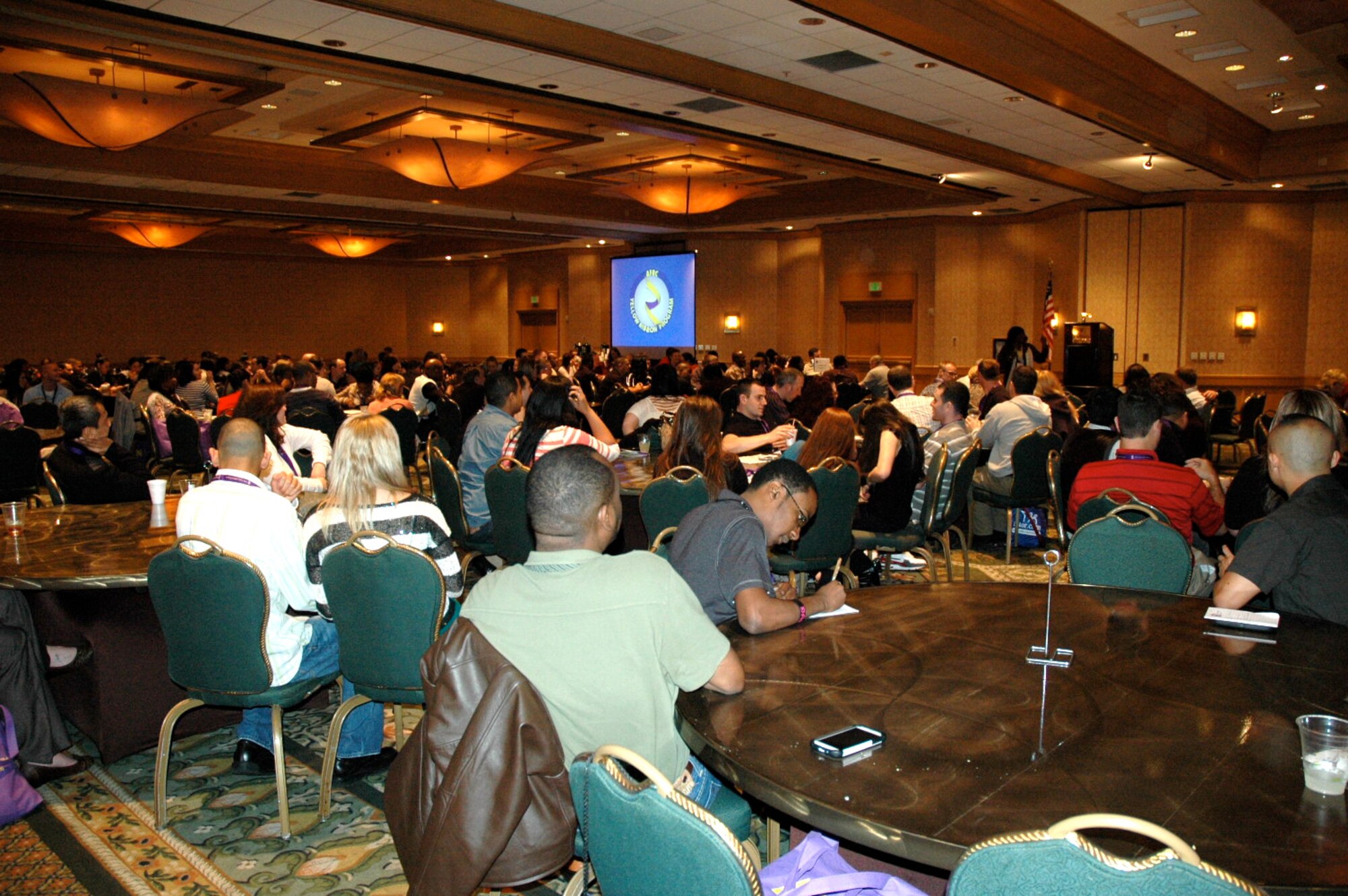 Hundreds of people packed the ballroom at the Yellow Ribbon event in Costa Mesa to hear about how thier Tricare and VA benifits change as reservists come off of active duty after a deployment. The event included several discussion sessions on health and welfare, money management, and reconnecting with family members after a long absense.(U.S. Air Force Photo Capt. Joe Simms)