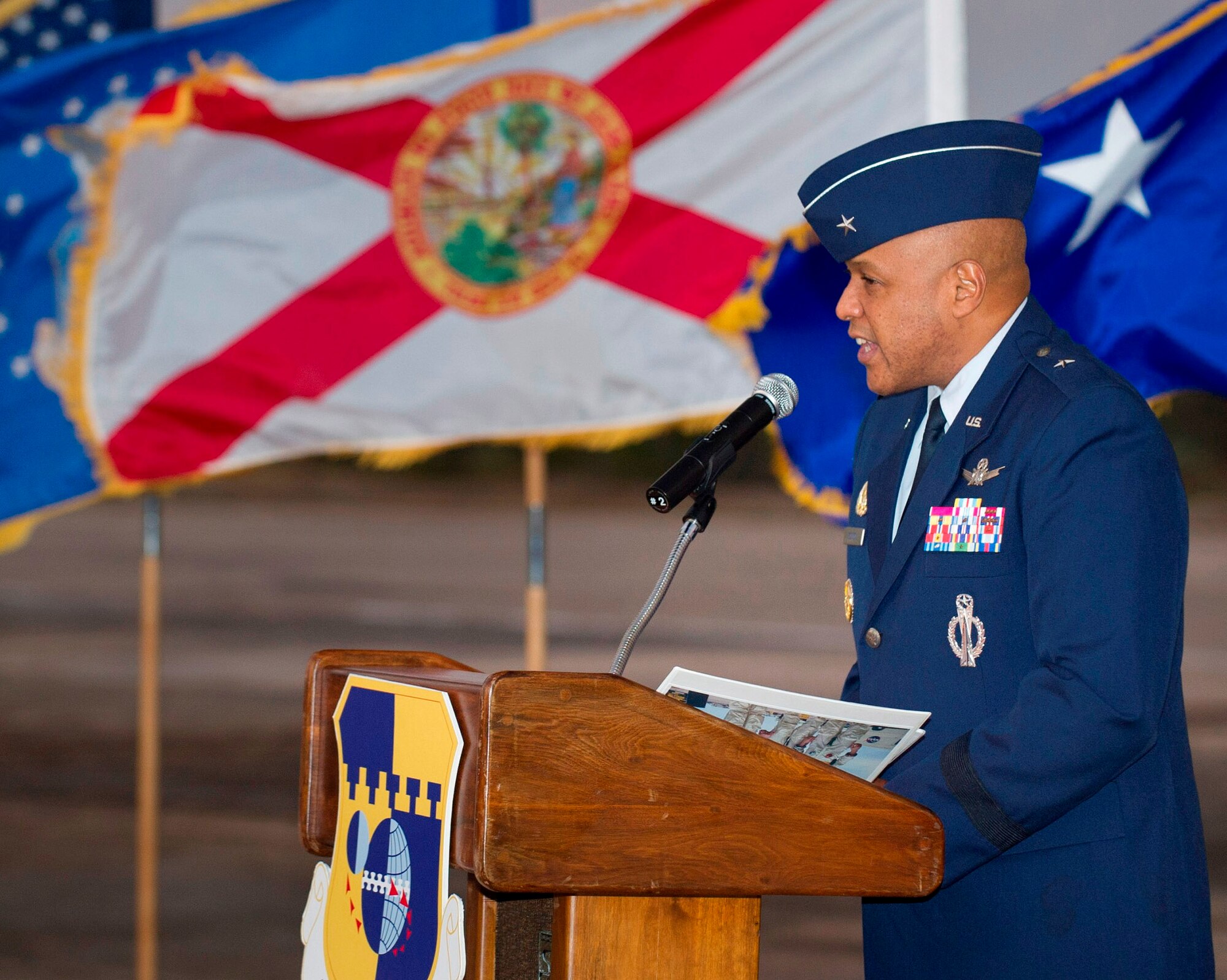 Brig. Gen. Anthony Cotton, commander, 45th Space Wing, pays tribute to those who gave the ultimate sacrifice during the 45th anniversary of the Apollo 1 tragedy. The ceremony was held to honor three American spaceflight heroes, Air Force Lt. Cols. Edward H. White II and Virgil "Gus" Grissom, along with the third member of their Apollo 1 team, Navy Lt. Cmdr. Roger Chafee, who were all killed during a "full dress rehearsal" in their Saturn 1B rocket Jan 27, 1967. (U.S. Air Force Photo/ Matthew Jurgens)
