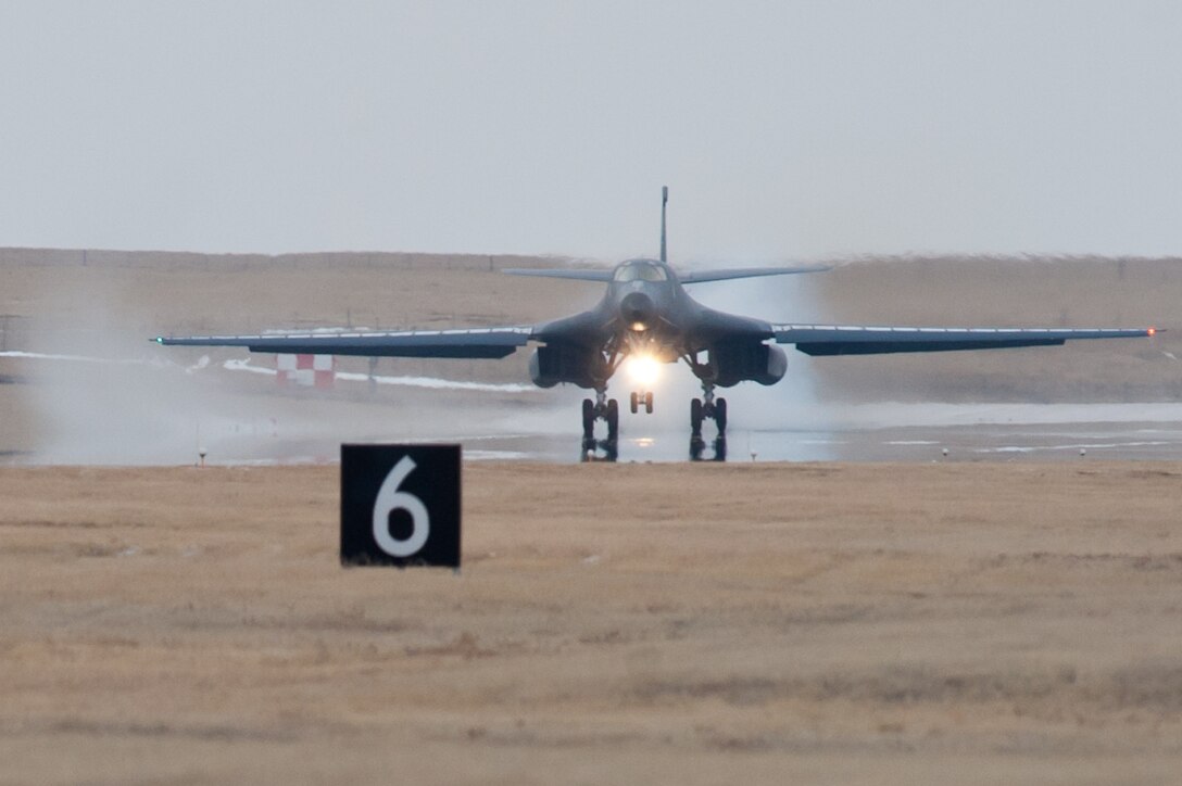A B-1 bomber lands on the runway at Ellsworth Air Force Base, S.D., Jan. 23, 2013. Aircrews from the 37th Bomb Squadron returned home safely after a six-month deployment to Southwest Asia. (U.S. Air Force photo by Airman 1st Class Kate Thornton-Maurer/Released)