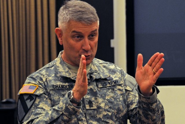 Sgt. Maj. of the Army Raymond F. Chandler III addresses about 50 sergeants major and command sergeants major who are attending the "Command Sergeants Major Legal Orientation," the first three-day pilot course, which started Jan. 29, 2013, in The Judge Advocate General's Legal Center & School, on the campus of the University of Virginia in Charlottesville, Va. There were about 50 attendees. (U.S. Army photo by David Vergun/Released)