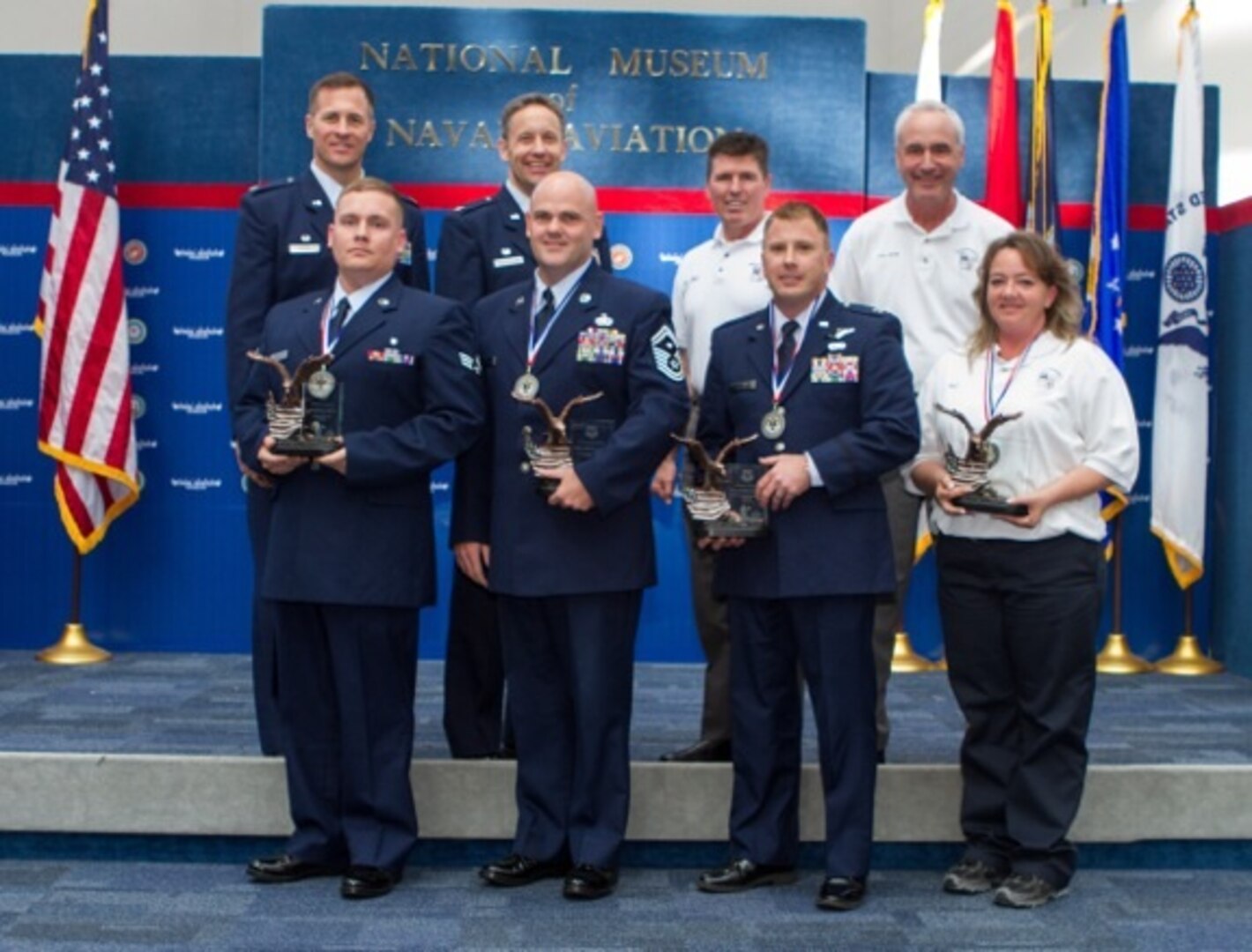 Annual award winners from the 12th Flying Training WIng's 479th Flying Training Group pose for a photo with 12th FTW leadership after the ceremony at Naval Air Station Pensacola, Fla., January 29, 2013. Due to its geographically separated nature, members of the wing's 306th and 479th Flying Training Groups were not able to attend the wing's formal banquet held at Joint Base San Antonio-Randolph, Texas January 25. Instead they were honored at individual events at their respective home stations, the U.S. Air Force Academy, Colo., and Naval Air Station Pensacola, Fla. on January 28 and 29. Typically all nominees are sent TDY to the ceremony, but having separate events saved the wing nearly $30,000.(Courtesy Photo by Master Sgt. Michelle Alexander)