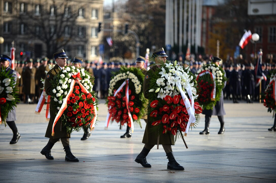 Members of the Polish government and family members laid wreaths at the tomb of the unknown soldier during the ceremony.  