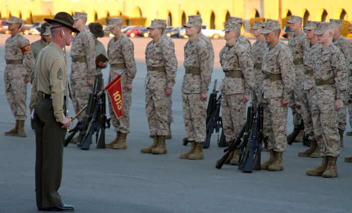 Recruits of Company A, 1st Recruit Training Battalion, await the next order from their unit leader during Final Drill aboard Marine Corps Recruit Depot San Diego Jan. 7.