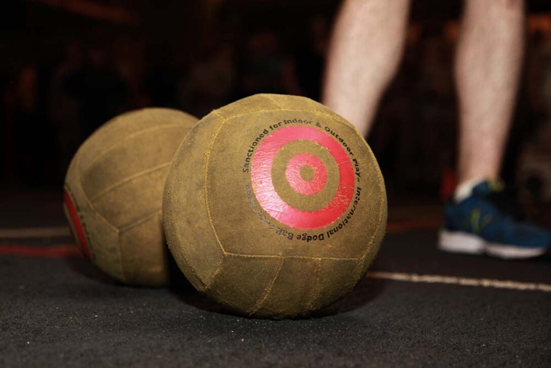Marines and sailors with the 15th Marine Expeditionary Unit and Peleliu Amphibious Ready Group participated in a dodgeball tournament in the hangar bay of the USS Peleliu, Jan. 24. The dodgeball challenge was the eighth competition of the Campbell Cup, a bi-monthly challenge that pits teams within the 15th Marine Expeditionary Unit and Peleliu Amphibious ARG against each other. The 15th MEU is deployed as part of the Peleliu ARG as a U.S. Central Command theater reserve force, providing support for maritime security operations and theater security cooperation efforts in the U.S. 5th Fleet area of responsibility. (U.S. Marine Corps photo by Cpl. John Robbart III/Released)