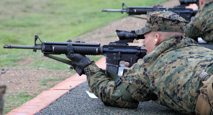 A recruit of Company K, 2nd Recruit Training Battalion, aims in on a target 500-yards away at Edson Range aboard Marine Corps Base Camp Pendleton, Calif. Jan. 24. Recruits must become proficient with the rifle and qualify at the firing range during the sixth week of recruit training, known as Firing Week.