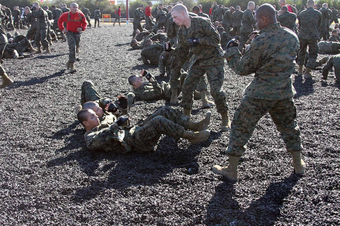 A recruit of Company C, 1st Recruit Training Battalion, reset to the basic warrior stance after performing a counter to a hold during a Marine Corps Martial Arts Program session aboard Marine Corps Recruit Depot San Diego Jan. 14. Recruits learn to return to the basic warrior stance in order to prepare to execute another technique.
