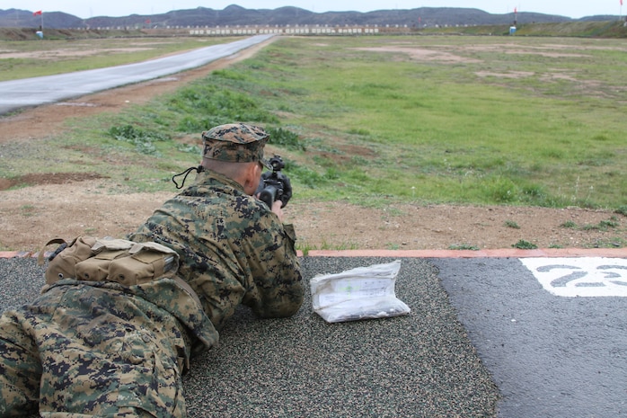 A Company K recruit lies in the prone position and aims down-range at the 500-yard targets at Edson Range, Marine Corps Base Camp Pendleton, Calif., Jan. 24.
