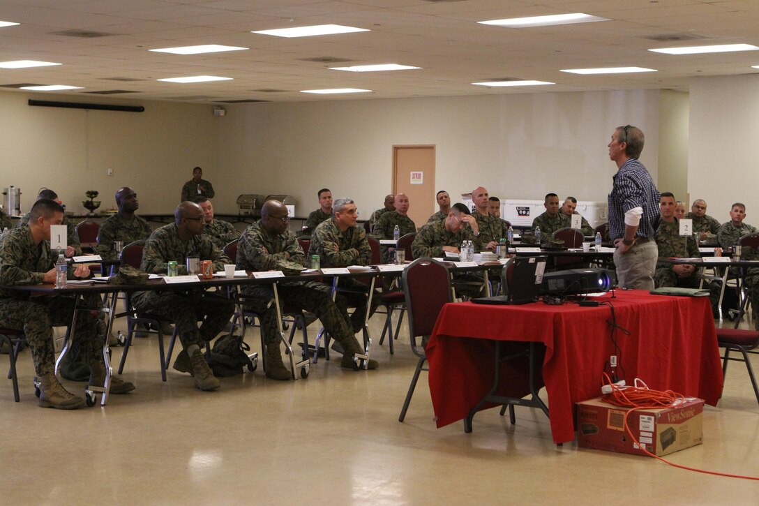 Senior enlisted leaders listen to a guest speaker at the Sergeants Major Symposium aboard Marine Corps Air Station Miramar, Calif., Jan. 17. The symposium is a semi-annual event where leaders discuss and resolve issues facing Marines across the command.  This is one of many ways senior enlisted leaders are discussing and finding solutions to the issues focused in the Committed and Engaged Leadership Campaign.  