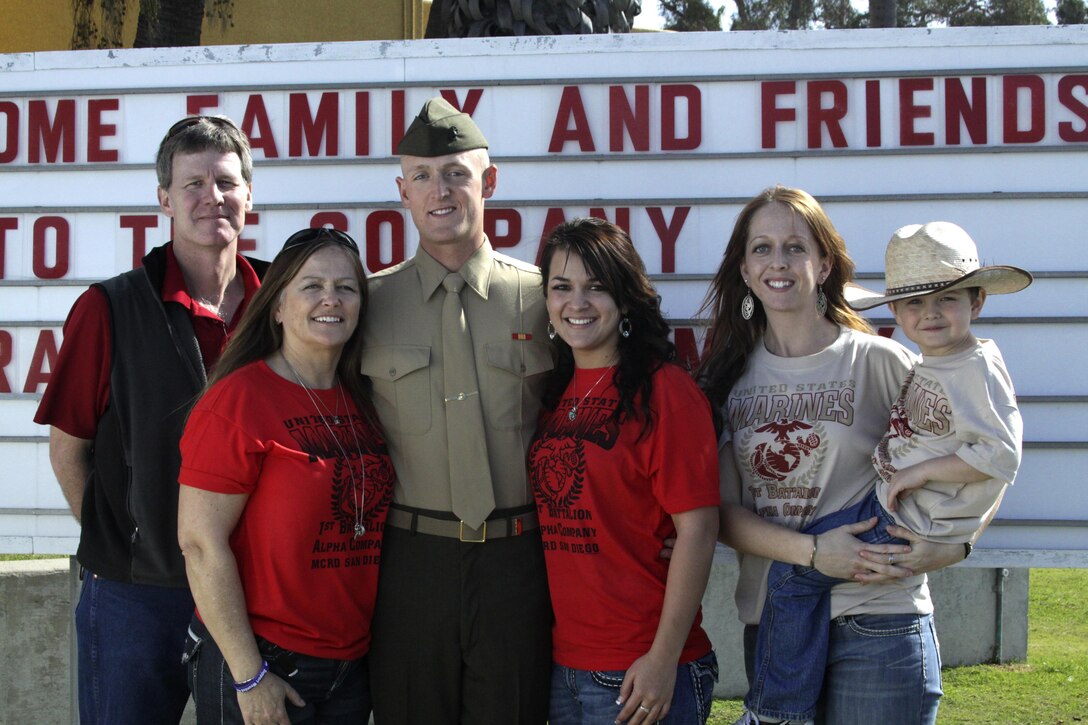 Lance Cpl. Jace Ellis, honor graduate, Alpha Company, poses with his family during family day at Marine Corps Recruit Depot San Diego, Jan. 31. Ellis is a Solmon Idaho native, and was recruited out of Recruiting Station Salt Lake City.