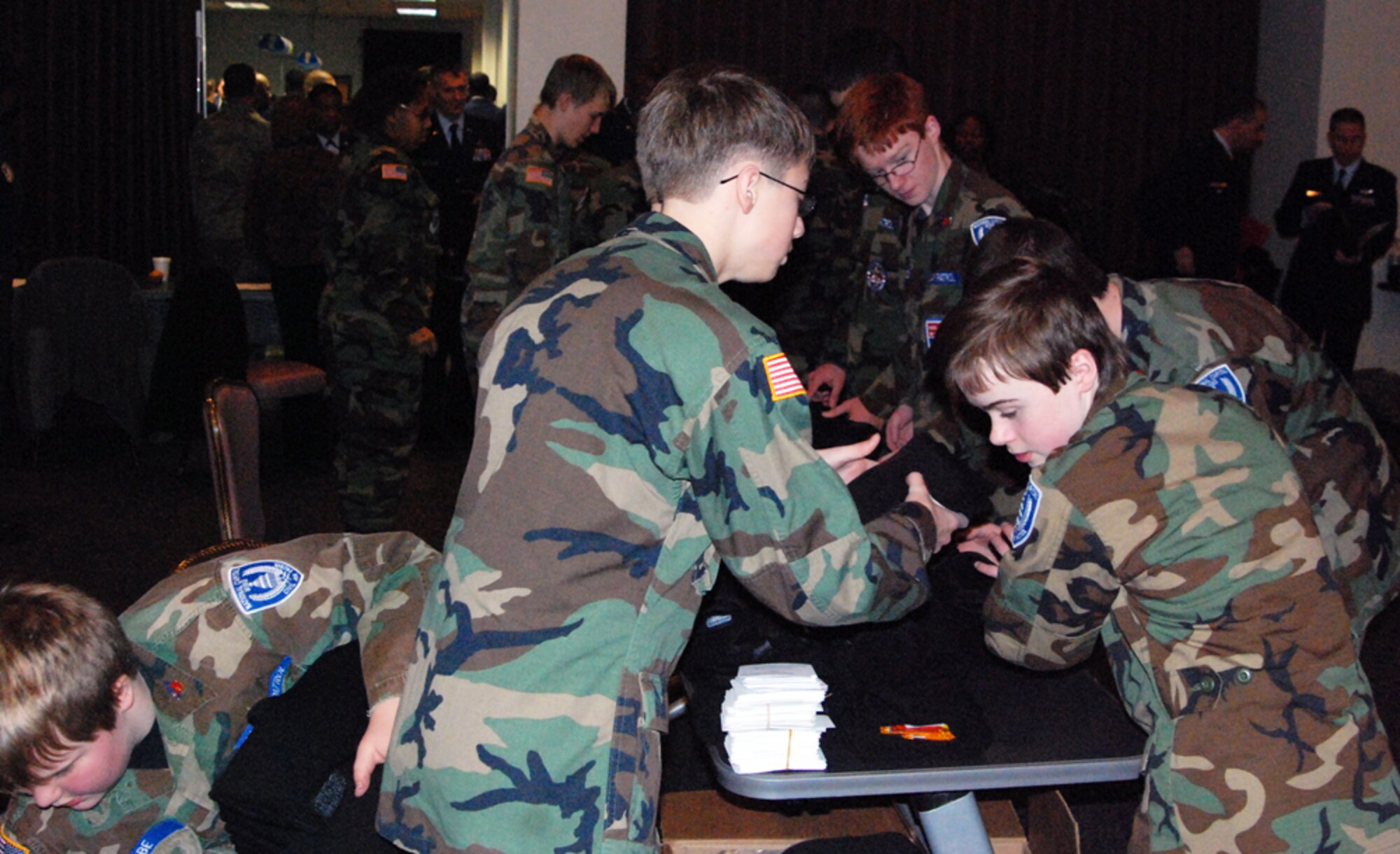 National Capital Region Civil Air Patrol cadets prepare to hand out cold weather gear to Airmen from Joint Base Andrews in preparation for the 57th Presidential Inauguration Jan. 21, 2013. (U.S. Air Force photo/Aletha Frost) 
