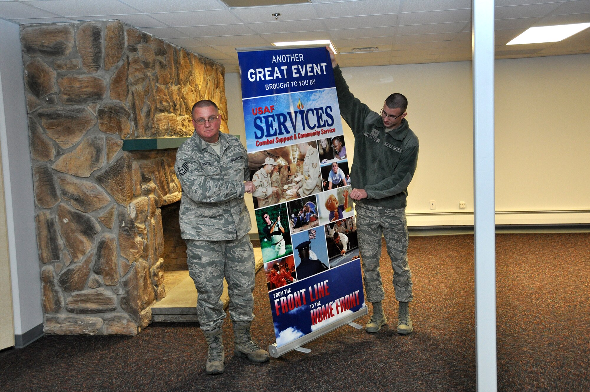 Tech. Sgt. Andrew Smith and Senior Airman Paul Bucholtz, both from the 914th Force Support Squadron Services Sustainment Flight, begin to move into their newly renovated office building on the Niagara Falls Air Reserve Station, N.Y. January 5, 2013.  This remodeled building previously was used as the officer and enlisted club for many years and will now house several FSS organizations as well as a Civil Air Patrol unit.  (U.S. Air Force photo by Master Sgt. Kevin Nichols)