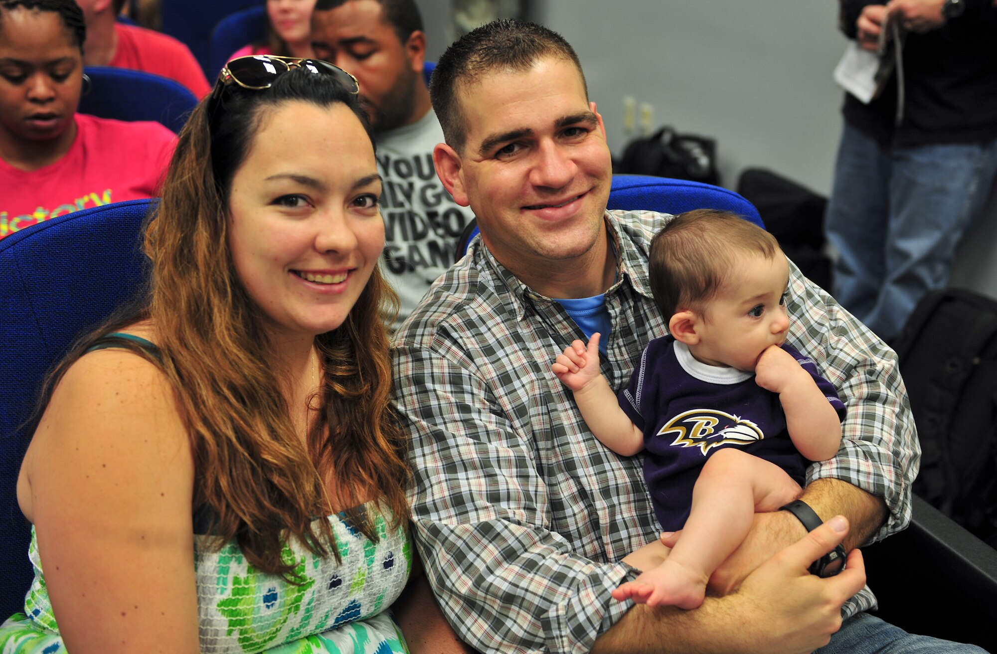 U.S. Air Force Tech. Sgt. Paul Wanamaker, his wife Jen and son Lake, pose for a photo Jan. 29, 2013, on Moody Air Force Base, Ga. Wanamaker deployed with Airmen from the 23d Maintenance Group, 347th Rescue Group and 23d Logistics Readiness Squadron to Europe. (U.S. Air Force photo by Airman Alexis Grotz/Released)