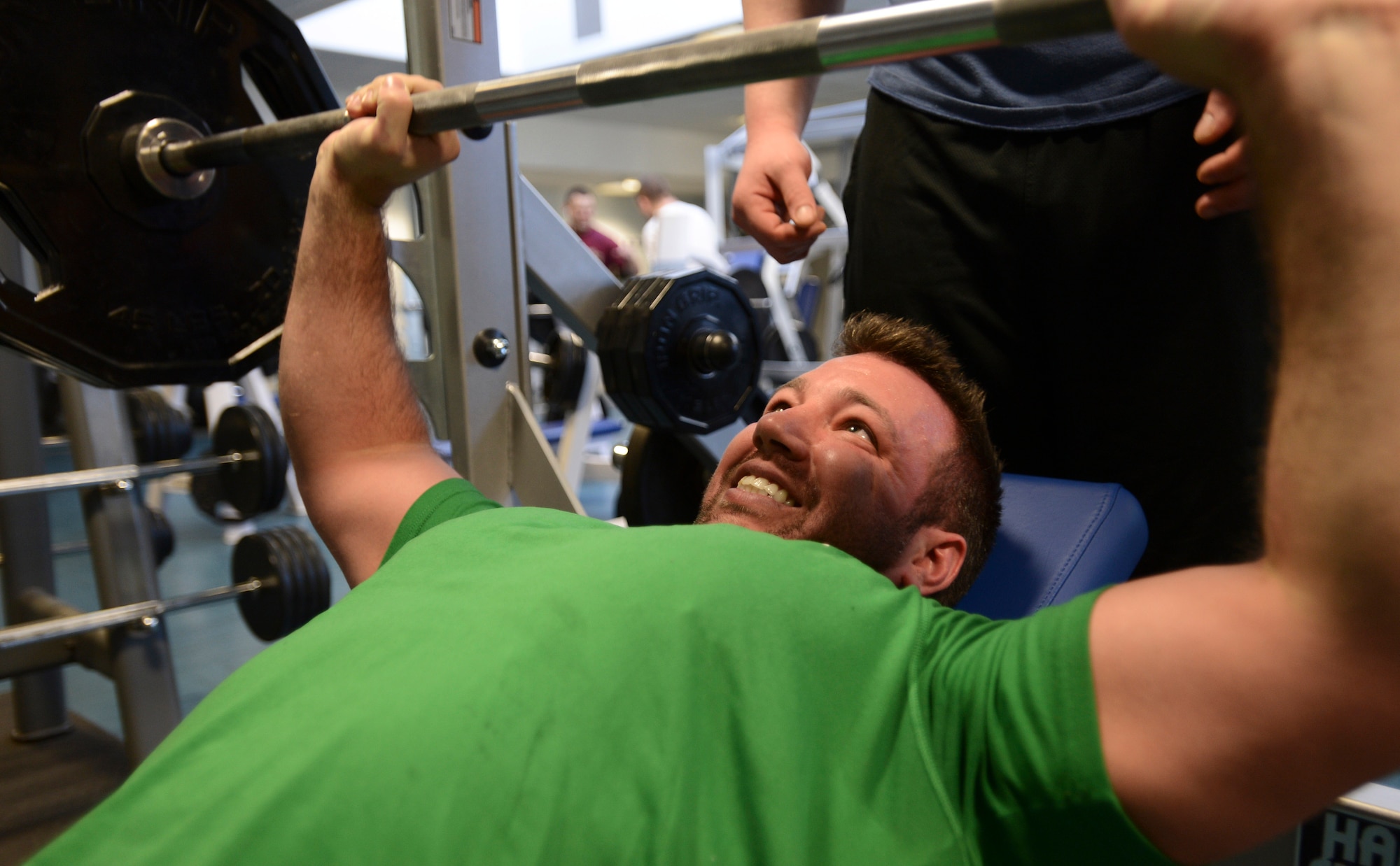 ROYAL AIR FORCE LAKENHEATH, England - Bill Purcell, a RAF Lakenheath visitor and Operation Enduring Freedom veteran, performs an incline bench press on a new piece of equipment at the 48th Fighter Wing Fitness Center Jan. 30, 2012. The center recently assembled and placed new equipment, which is valued at $70,000 and includes items such as bench presses, smith machines, free weight machines and treadmills. (U.S. Air Force photo by Staff Sgt. Stephen Linch)