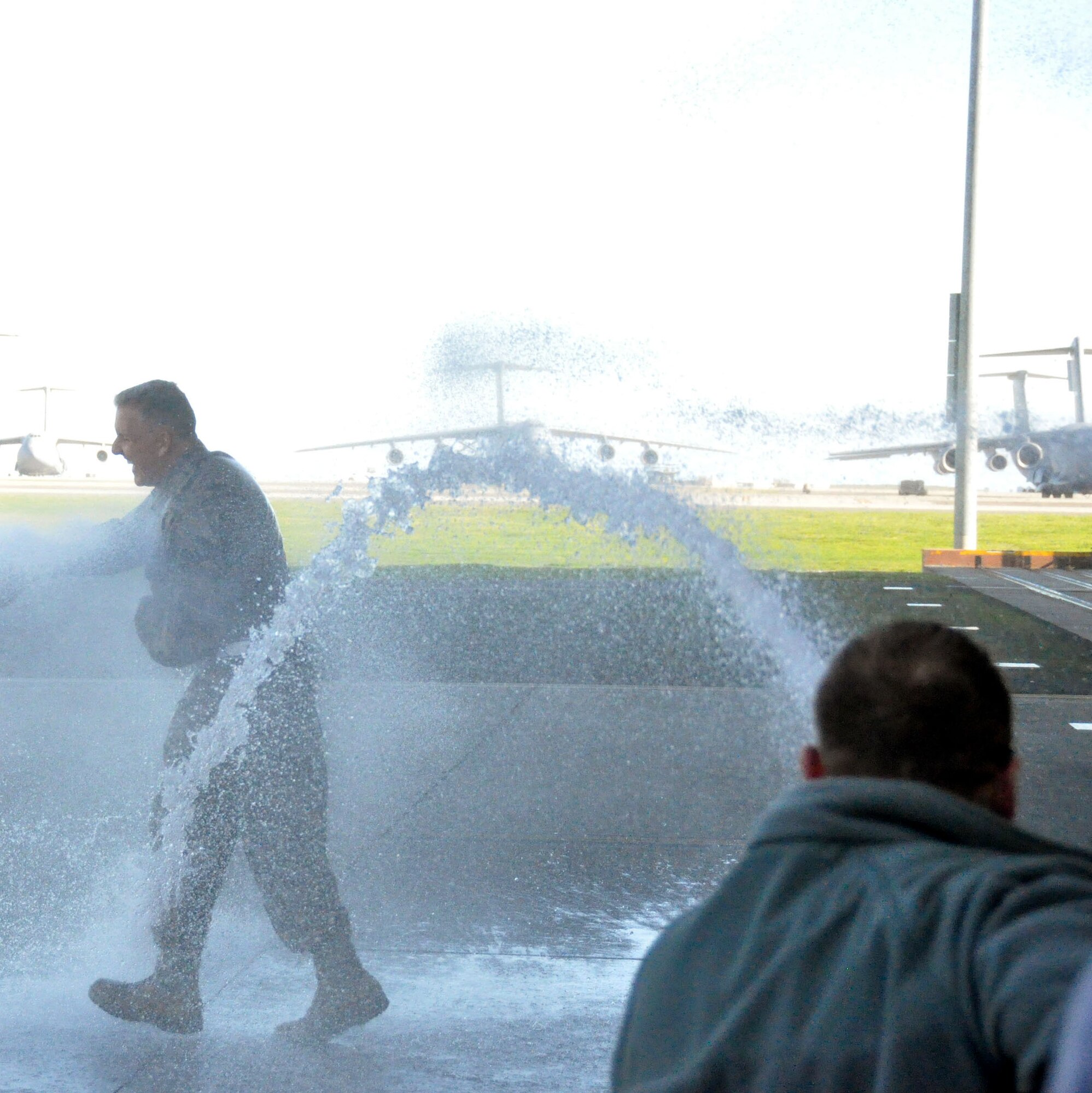 TRAVIS AIR FORCE BASE, Calif. -- Brig. Gen. Jay Flournoy is surprised with a "faux fini-flight" right before he headed to Buckley Air Force Base, Colo., to serve as the Commander of the Headquarters Air Reserve Personnel Center. (U.S. Air Force photo/Senior Airman Cindy Alejandrez)