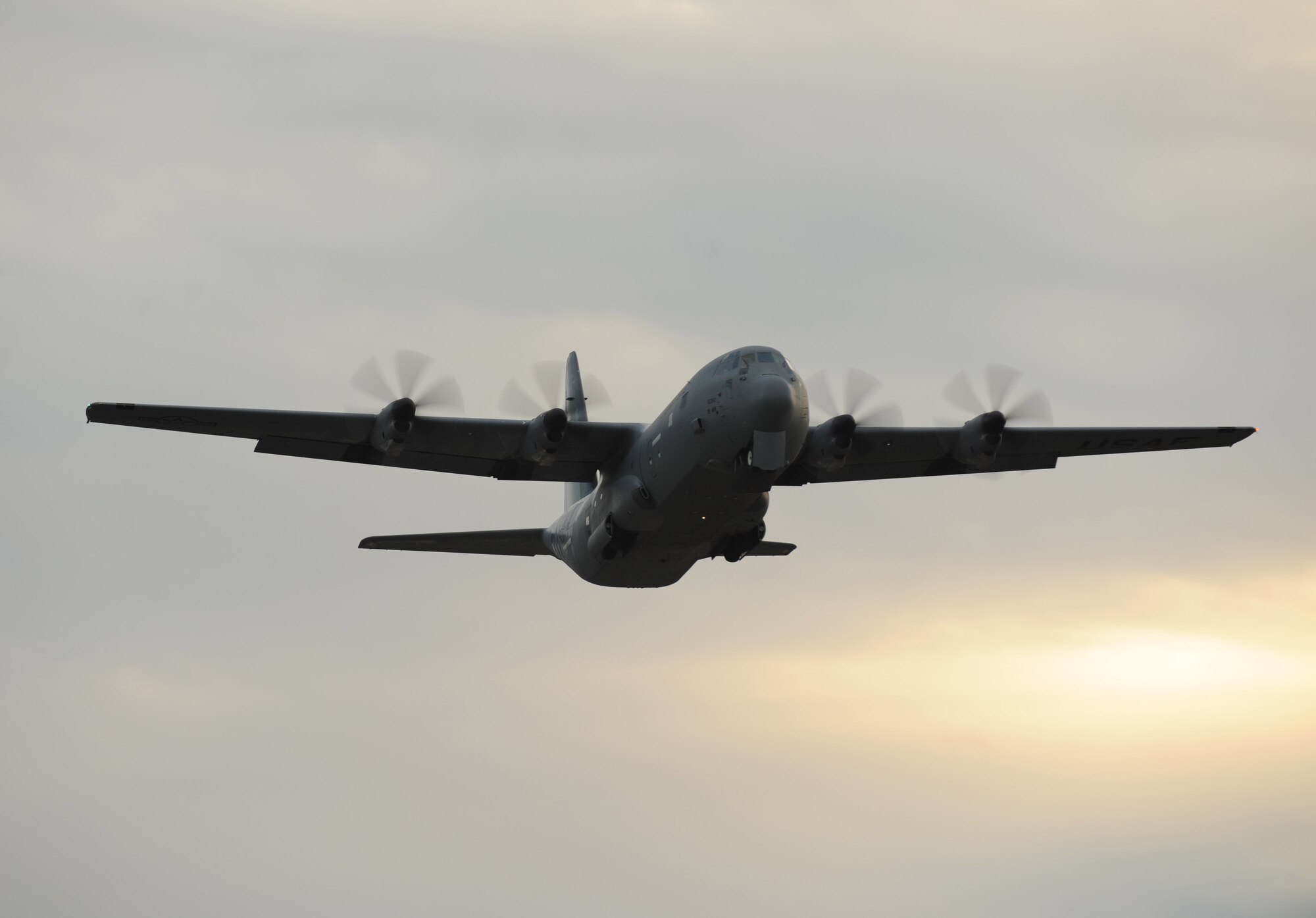 A C-130 from Little Rock Air Force Base, Ark., flys over the base Airfield, Nov. 14, 2012. The 19th Operations Group on base recently truncated their fly week from five days to four, an innovative move that increased training completion rates and face time between leadership, supervisors and front-line Airmen (U.S. Air Force photo by Scott Poe) 